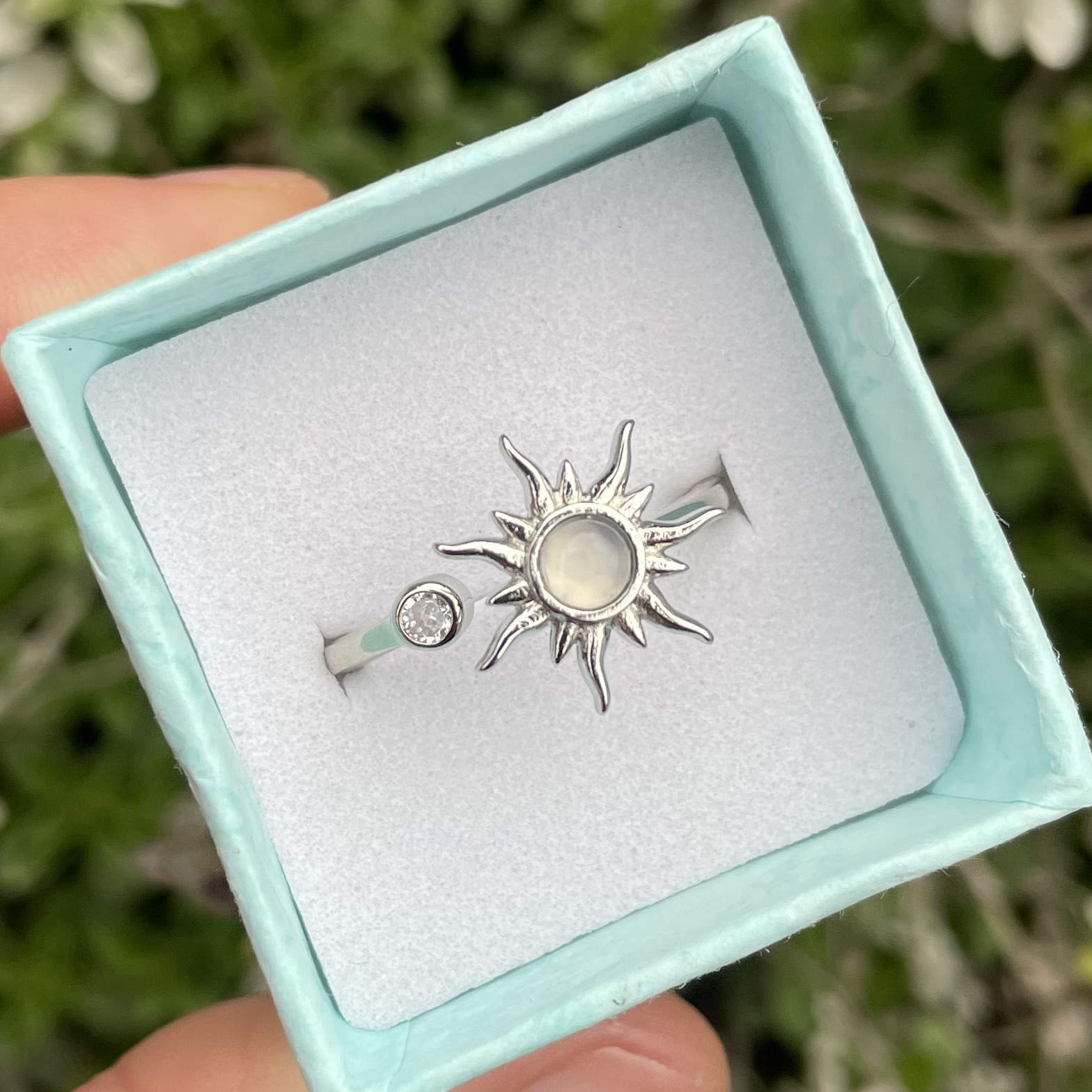 anillo sol giratorio